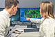 Researchers at the Core Facility Hohenheim (CFH) discuss an image taken with the confocal super resolution microscope (ZEISS LSM 980). | Image source: University of Hohenheim / Oliver Reuther