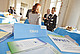 An Thementischen zu EMAS, Initiativen, Förderung und Green University konnten sich die Gäste informieren und austauschen. Bild: Universität Hohenheim/Dauphin