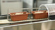Wie bei einer Modelleisenbahn reihen sich die 30-g-Backformen mit glutenfreien Brotvarianten auf der Mini-Backstraße. | Bildquelle: Unger+ / Frank Roller